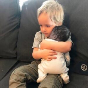 The stillborn baby was placed in his old