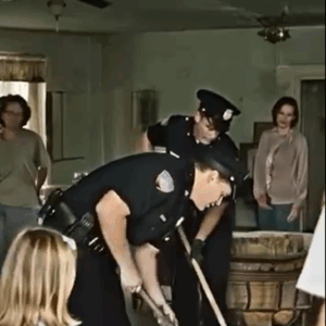 A girl alerted the police, claiming her father was trapped beneath the floor; when officers lifted the boards, they discovered a horrifying sight