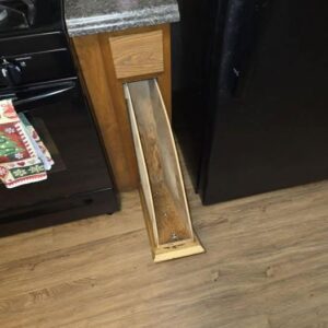 The Hidden Purpose of That Narrow Kitchen Cabinet by the Oven