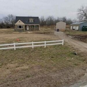 Incredible Real Estate Opportunity: 4-Bedroom Home with Acreage and Detached Garage in Augusta, Kansas