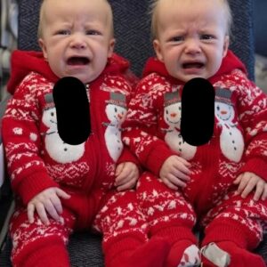 Young woman puts both babies inside the fir… See more