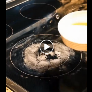 What’s the method to clean and remove scratches from my glass stovetop?