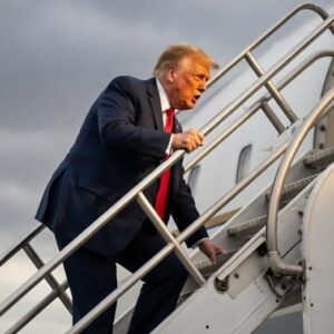 Donald Trump falls on the stairs while boarding Air Force One!